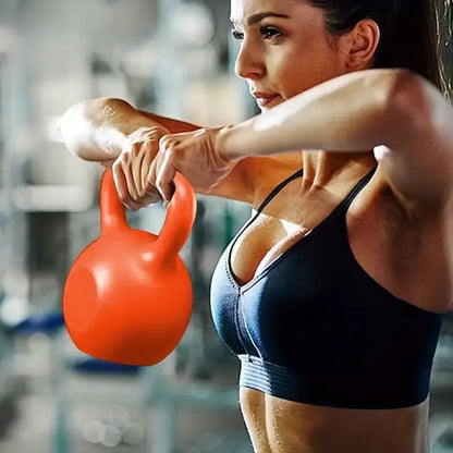 Focused woman performing a kettlebell upright row exercise to build upper body strength in a gym setting