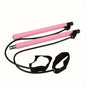 Pink resistance band with handles on a white background