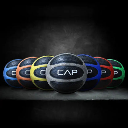 Colorful CAP medicine balls with textured grip for strength and fitness training