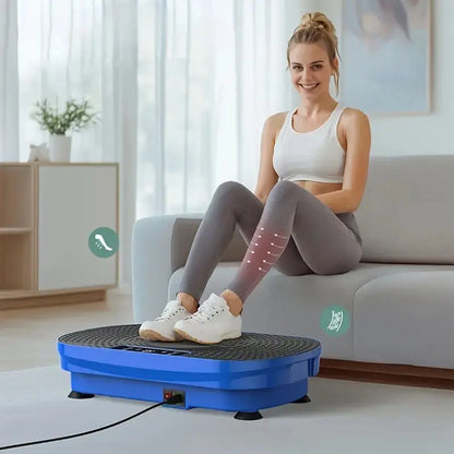 Young woman using a blue vibration plate while sitting on a sofa for relaxing leg massage and circulation boost during home workout